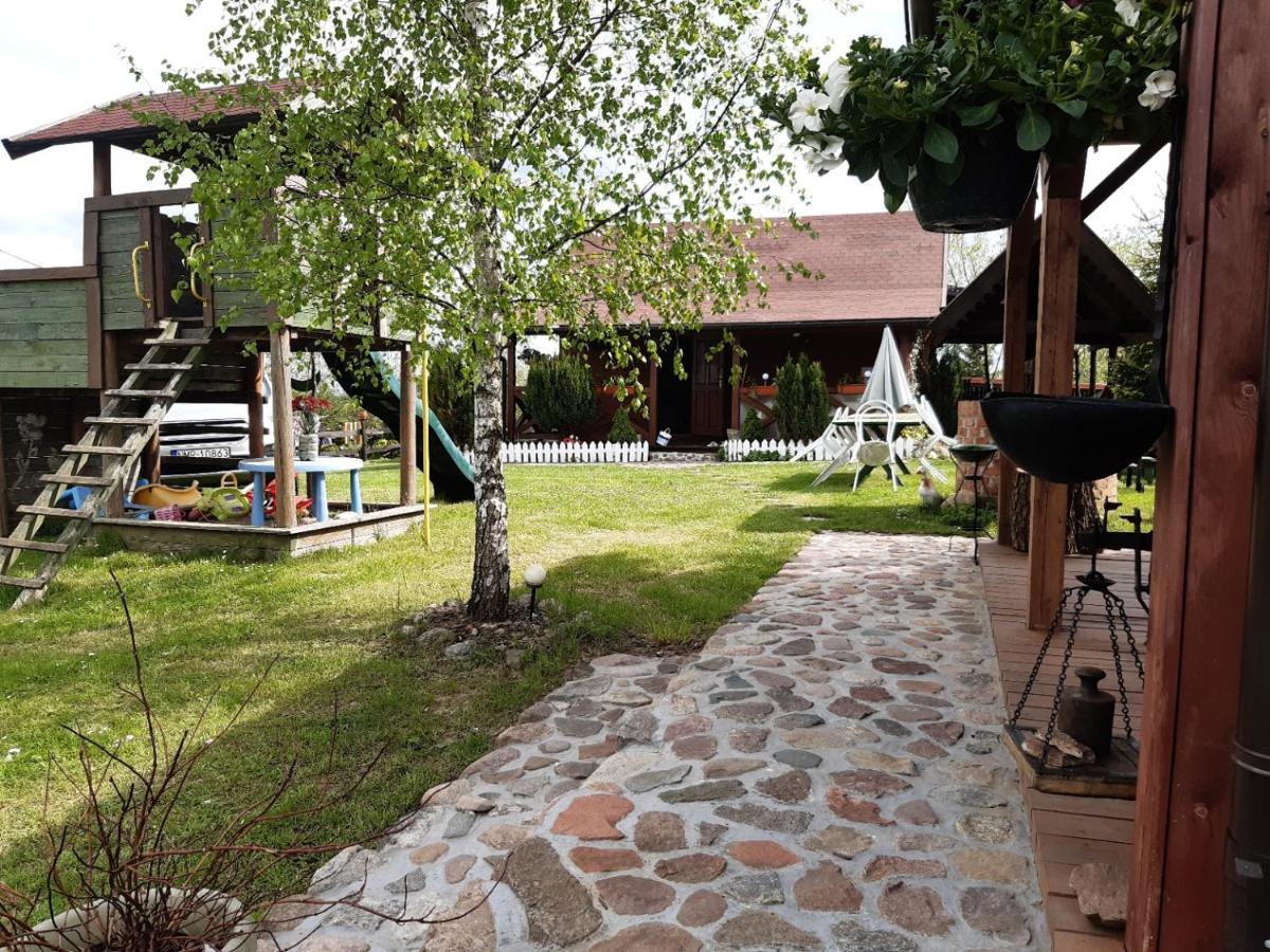 Domek W Kwiatach Zyndaki ภายนอก รูปภาพ